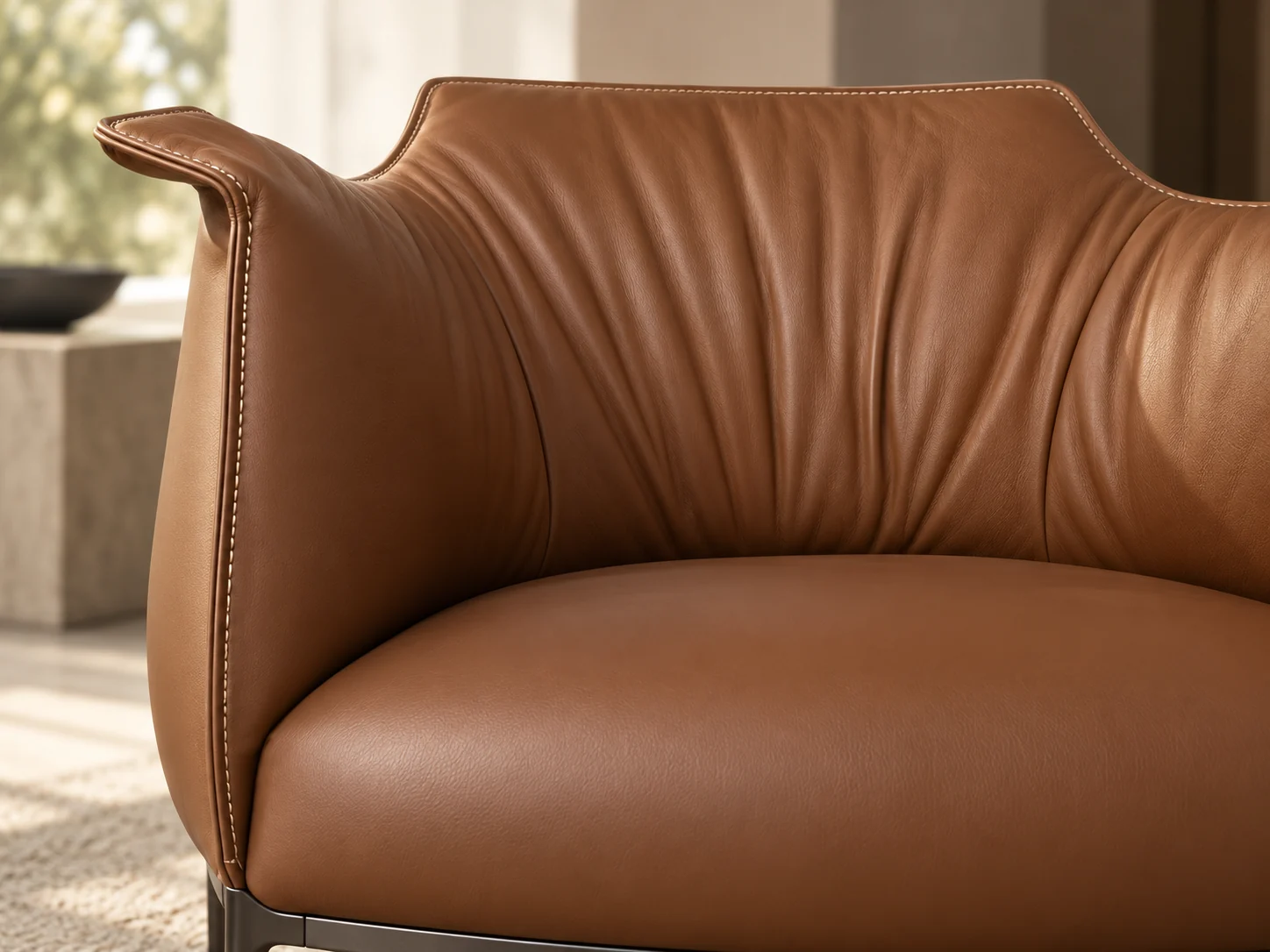 Detail of Archibald’s gathered leather back and seat